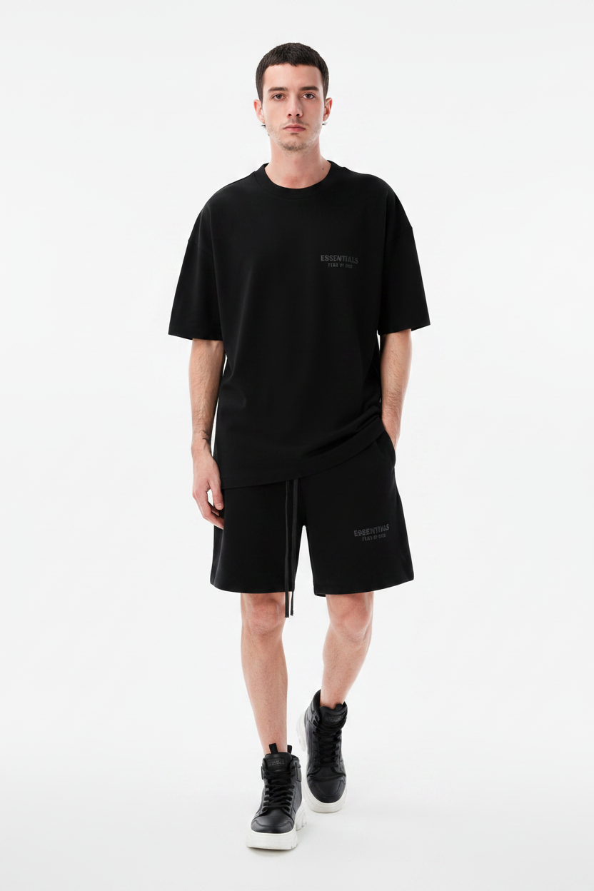 Male model in black essentials outfit